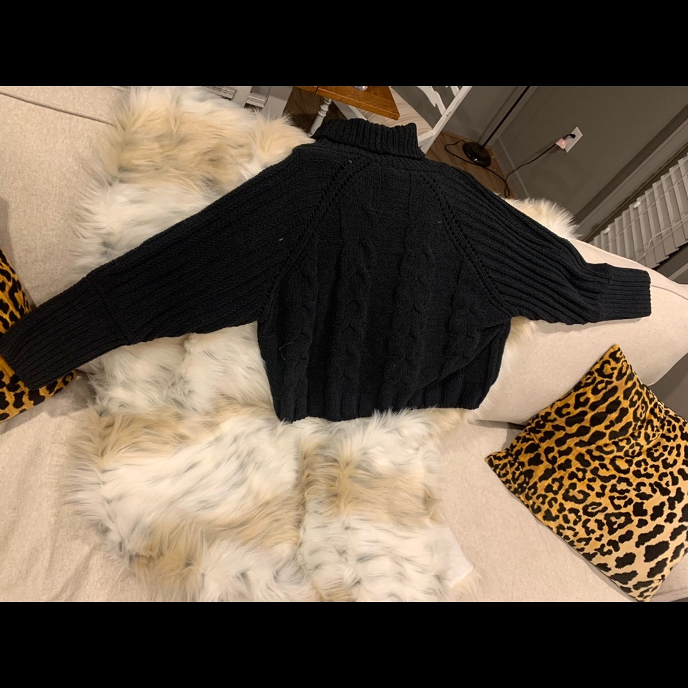 Black textured turtleneck sweater